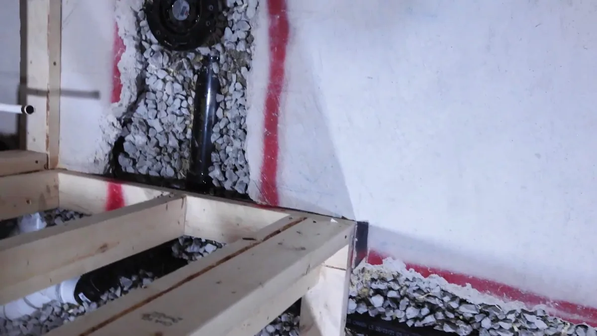 Plumber thawing a frozen supply line before it splits open