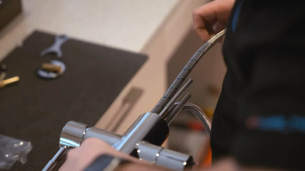 Plumber replacing a worn cartridge inside a Mountain View bathroom faucet