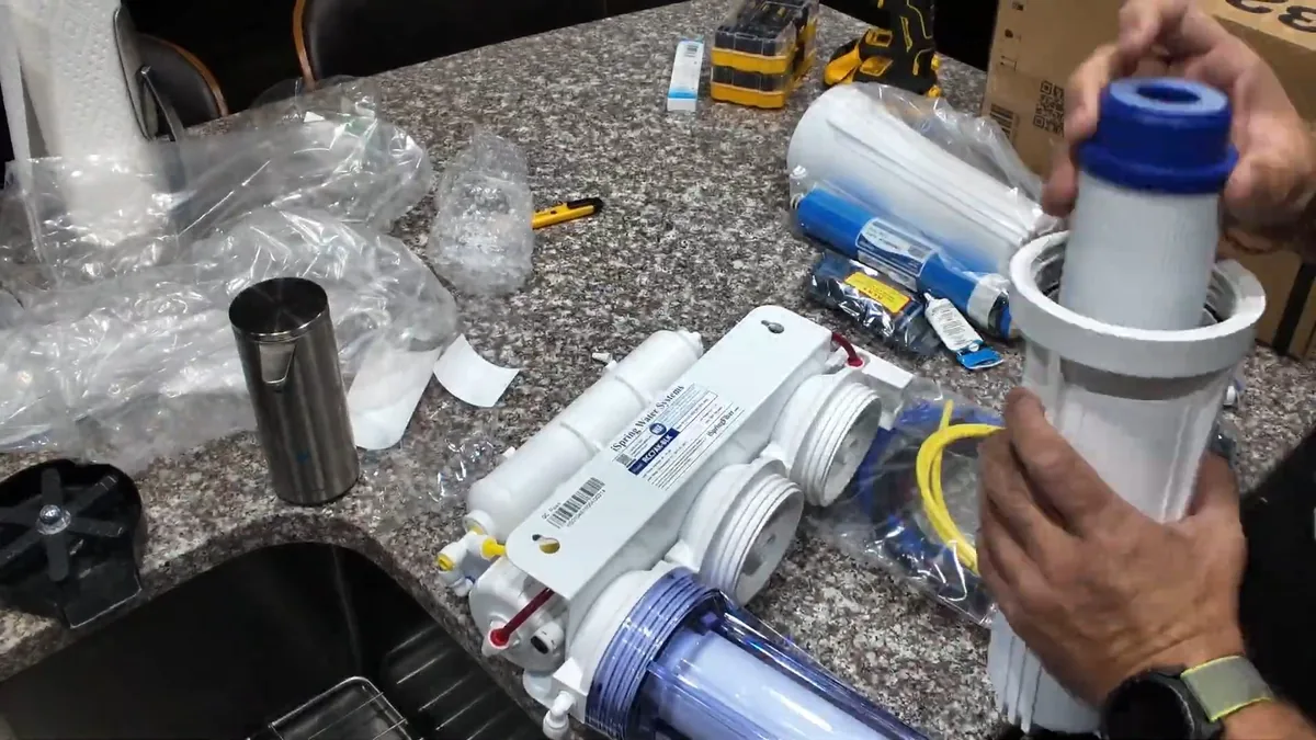 Reverse osmosis filtration membrane and housing for treating hard water