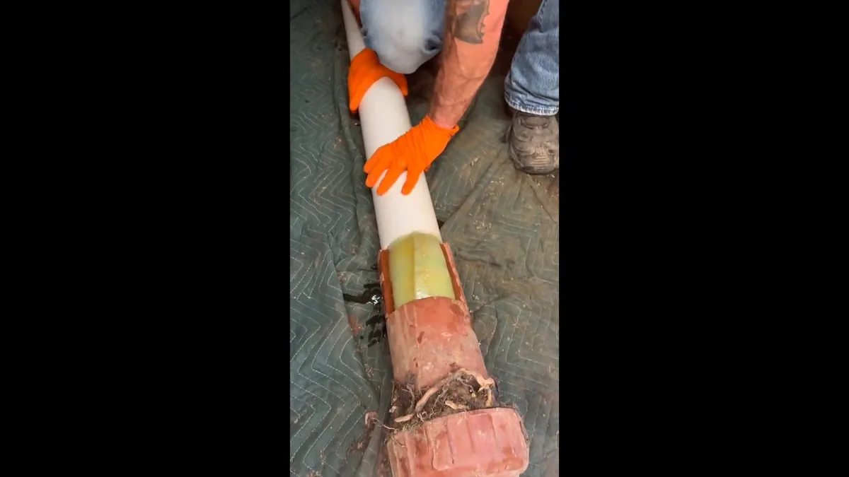 Plumber replacing a rural property's underground water line in Palominas