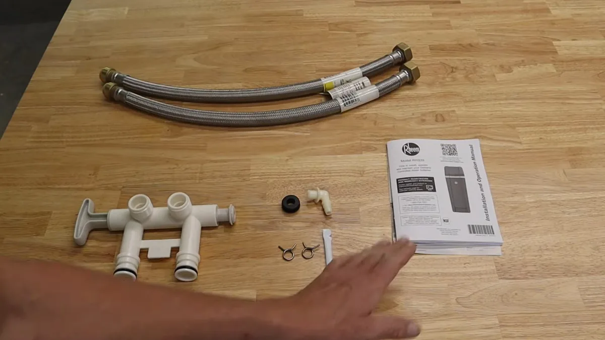 Plumber installing an under-sink reverse osmosis drinking water system